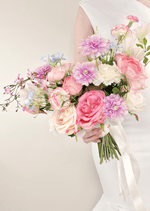 Artificial wedding bridal bouquet, handheld angled view of pink faux roses, lilac daisies, white flowers and green sprigs. Made in Melbourne by Flowers For Ever After, shipping Australia and Worldwide.