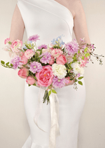 Artificial wedding bridal bouquet, handheld front view of pink faux roses, lilac daisies, white blooms and branching green sprigs. Made in Melbourne by Flowers For Ever After, shipping Australia and Worldwide.