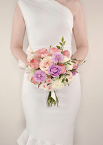 Artificial wedding bridesmaid bouquet, handheld front view of pink and purple faux roses, lilac daisies and white flowers. Made in Melbourne by Flowers For Ever After, shipping Australia and Worldwide.