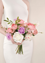 Artificial wedding bridesmaid bouquet, reverse view of pink and purple faux roses, white blooms and branching green leaves. Made in Melbourne by Flowers For Ever After, shipping Australia and Worldwide.
