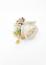 Artificial wedding boutonniere, angled view of a pale faux rose with small light flowers and greenery. For formals, proms and ball occasions. Made in Melbourne by Flowers For Ever After, shipping Australia and Worldwide.