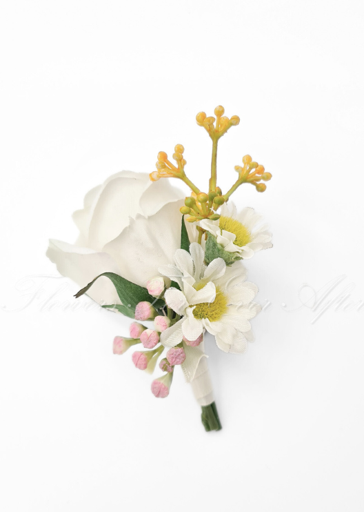 Artificial wedding boutonniere with a pale faux rose, small light flowers and green leaves, finished with wrapped stems. For formals, proms and ball occasions. Made in Melbourne by Flowers For Ever After, shipping Australia and Worldwide.