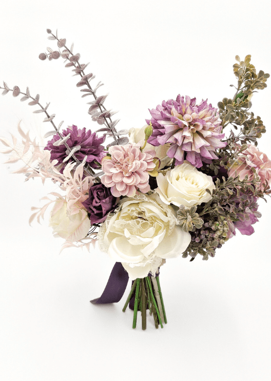 Artificial wedding bouquet, angled view of mixed faux flowers and green foliage. Made in Melbourne by Flowers For Ever After, shipping Australia and Worldwide.
