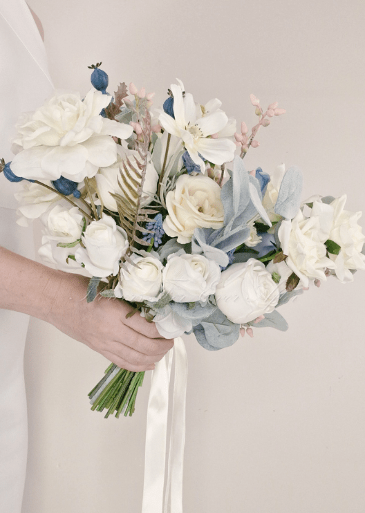 Artificial wedding bridal bouquet, angled view of mixed faux flowers and green leaves. Made in Melbourne by Flowers For Ever After, shipping Australia and Worldwide.
