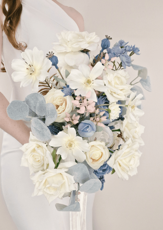 Artificial wedding bridal bouquet close-up showing layered faux flower petals and green foliage. Made in Melbourne by Flowers For Ever After, shipping Australia and Worldwide.