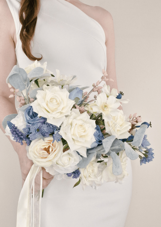 Artificial wedding bridal bouquet, front view of mixed faux blooms and green leaves. Made in Melbourne by Flowers For Ever After, shipping Australia and Worldwide.
