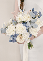 Artificial wedding bridal bouquet with mixed faux blooms, green foliage and a ribbon-wrapped handle. Made in Melbourne by Flowers For Ever After, shipping Australia and Worldwide.