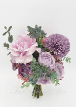 Artificial wedding bridesmaid posy with white faux roses, clustered white blooms and grey-green foliage, finished with a wrapped handle. Made in Melbourne by Flowers For Ever After, shipping Australia and Worldwide.