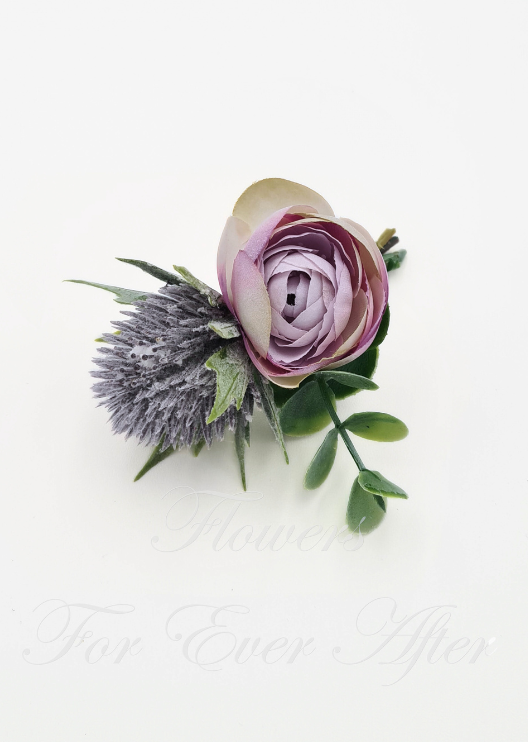 Artificial wedding boutonniere close-up with a white faux rose, small white flowers and green foliage. For formals, proms and ball occasions. Made in Melbourne by Flowers For Ever After, shipping Australia and Worldwide.