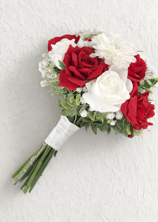 Artificial wedding bridesmaid bouquet, side view of red and white faux roses, pale eucalyptus and white-wrapped stems. Made in Melbourne by Flowers For Ever After, shipping Australia and Worldwide.