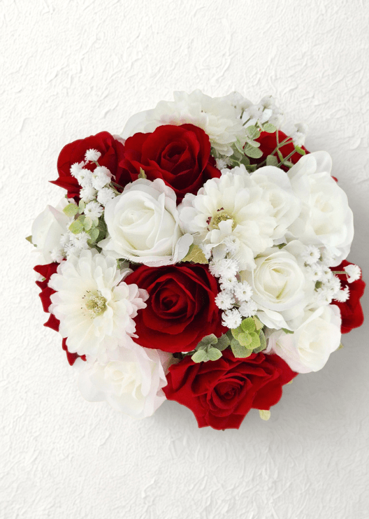 Artificial wedding bouquet, overhead view of red and white faux roses, white dahlias and tiny white flowers. Made in Melbourne by Flowers For Ever After, shipping Australia and Worldwide.