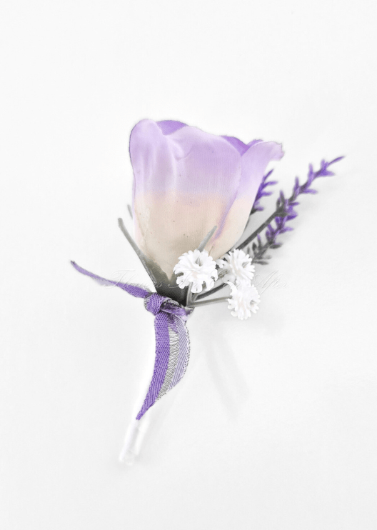 Artificial wedding boutonniere with a white-to-lilac faux rosebud, tiny white flowers, purple sprigs and purple ribbon. For formals, proms and ball occasions. Made in Melbourne by Flowers For Ever After, shipping Australia and Worldwide.