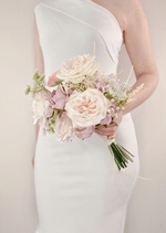Artificial wedding bridesmaid bouquet, angled view of white faux orchids and greenery. Made in Melbourne by Flowers For Ever After, shipping Australia and Worldwide.