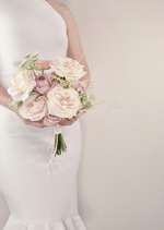 Artificial wedding bridesmaid bouquet close-up with white faux orchids, smaller flowers and green foliage. Made in Melbourne by Flowers For Ever After, shipping Australia and Worldwide.