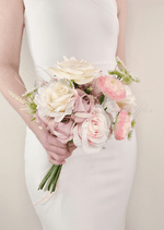 Artificial wedding bridesmaid bouquet, overhead view of white faux orchids and green foliage. Made in Melbourne by Flowers For Ever After, shipping Australia and Worldwide.