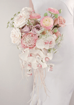 Artificial wedding cascading bridal bouquet close-up showing white faux orchid petals and green foliage. Made in Melbourne by Flowers For Ever After, shipping Australia and Worldwide.