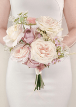 Artificial wedding bridesmaid bouquet with white faux orchids, small flowers and green foliage. Made in Melbourne by Flowers For Ever After, shipping Australia and Worldwide.