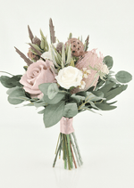 Artificial wedding bridesmaid bouquet, angled view of blush and ivory faux roses, pink spiky bloom, lotus pods and eucalyptus with blush-wrapped stems. Made in Melbourne by Flowers For Ever After, shipping Australia and Worldwide.