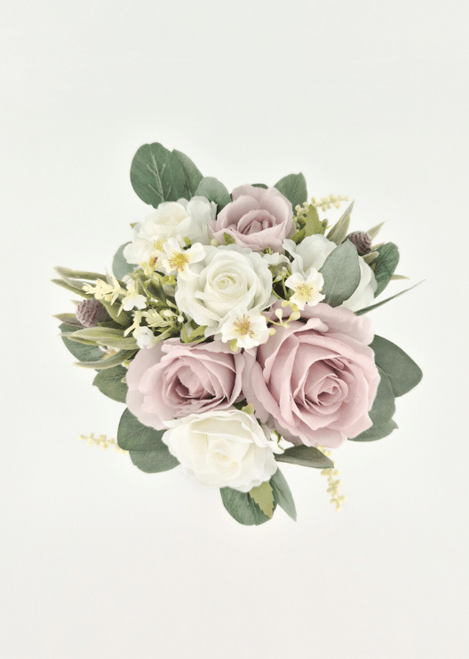 Artificial wedding small bouquet, overhead view of blush and ivory faux roses, cream flower sprigs, grey seedpods and eucalyptus. Made in Melbourne by Flowers For Ever After, shipping Australia and Worldwide.
