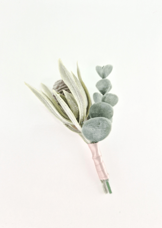 Artificial wedding boutonniere with a grey faux seedpod, pale narrow leaves, rounded eucalyptus and blush-wrapped stems. For formals, proms and ball occasions. Made in Melbourne by Flowers For Ever After, shipping Australia and Worldwide.
