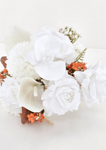 Artificial wedding bouquet, overhead view of white faux roses, orchids, hydrangea, orange sprigs and brown leaves. Made in Melbourne by Flowers For Ever After, shipping Australia and Worldwide.