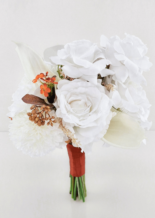 Artificial wedding bouquet with white faux roses, orchids, hydrangea, orange sprigs and brown leaves, finished with a rust-wrapped handle. Made in Melbourne by Flowers For Ever After, shipping Australia and Worldwide.