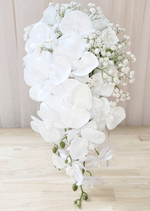 Artificial wedding cascading bridal bouquet with white faux orchids, roses, smaller blooms and green foliage. Made in Melbourne by Flowers For Ever After, shipping Australia and Worldwide.