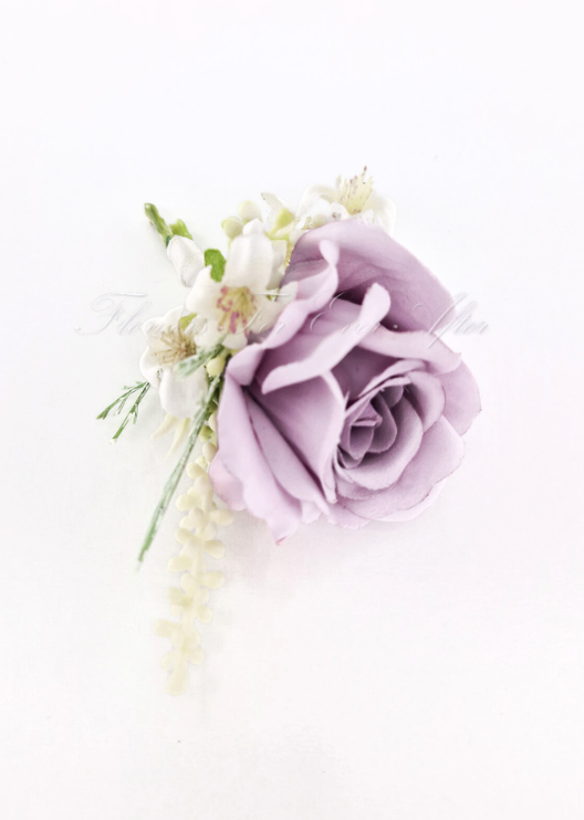 Artificial wedding boutonniere, overhead view of mauve faux rose petals, tiny ivory flowers and fine green sprigs. For formals, proms and ball occasions. Made in Melbourne by Flowers For Ever After, shipping Australia and Worldwide.