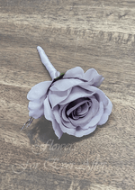 Artificial wedding boutonniere, top view of a mauve faux rose and dark filler sprigs. For formals, proms and ball occasions. Made in Melbourne by Flowers For Ever After, shipping Australia and Worldwide.