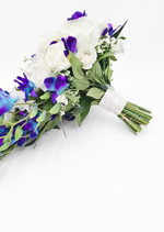 Artificial wedding bridal bouquet close-up with blush and white faux roses, white blooms and grey-green eucalyptus leaves. Made in Melbourne by Flowers For Ever After, shipping Australia and Worldwide.