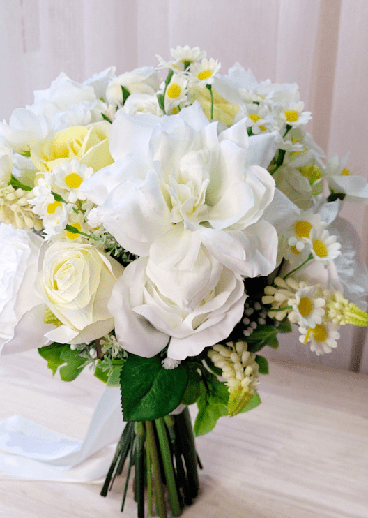 Artificial wedding bridal bouquet close-up showing faux rose petals and small blooms. Made in Melbourne by Flowers For Ever After, shipping Australia and Worldwide.