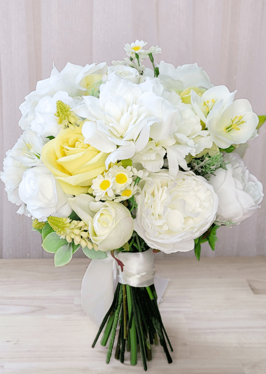 Artificial wedding bridal bouquet with mixed faux roses, smaller blooms and green foliage. Made in Melbourne by Flowers For Ever After, shipping Australia and Worldwide.