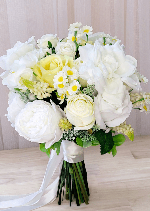Artificial wedding bridal bouquet, angled view of mixed faux roses and green leaves. Made in Melbourne by Flowers For Ever After, shipping Australia and Worldwide.