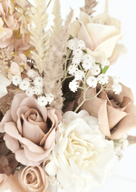 Artificial wedding bouquet detail showing taupe faux roses, ivory rose, pale plume-like sprigs and tiny white flowers. Made in Melbourne by Flowers For Ever After, shipping Australia and Worldwide.
