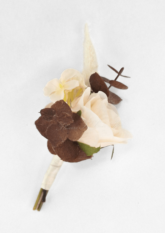 Artificial wedding boutonniere with a cream faux rosebud, brown and peach hydrangea, dark eucalyptus and pale plume-like sprig. For formals, proms and ball occasions. Made in Melbourne by Flowers For Ever After, shipping Australia and Worldwide.