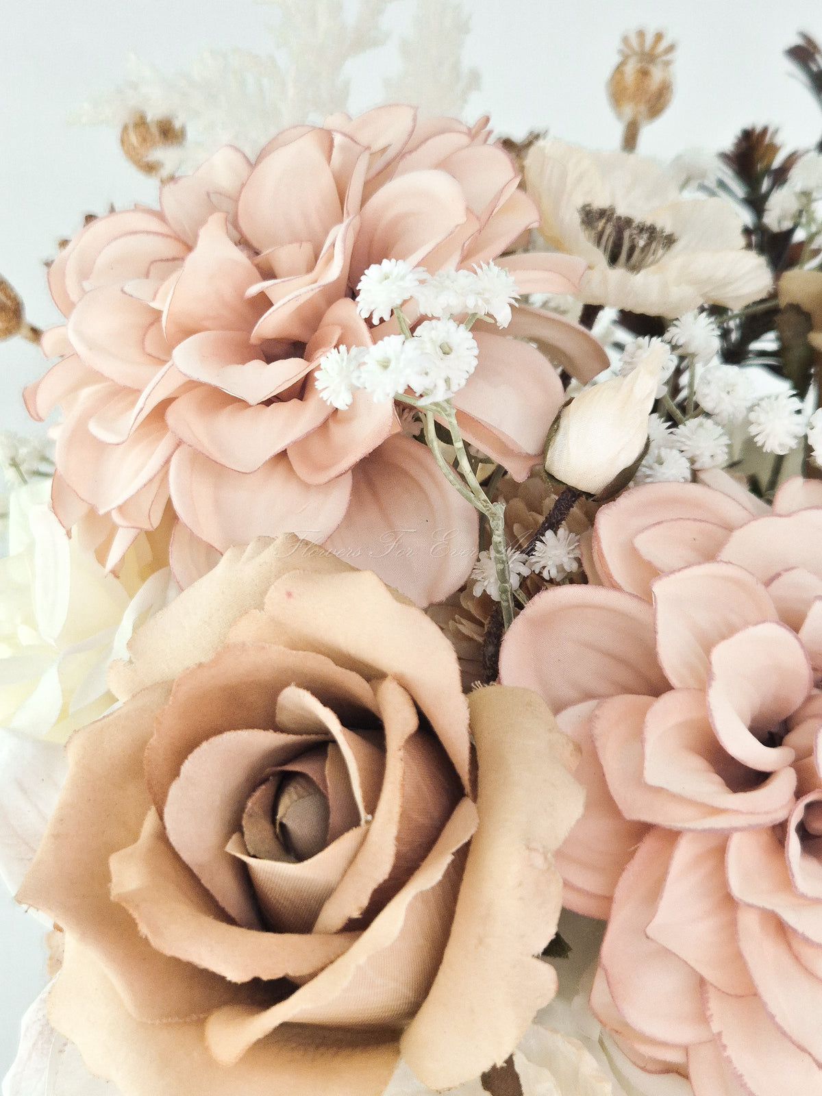Faux bridal bouquet featuring dusty blush dahlias, cappuccino roses, and delicate baby's breath in a warm romantic style.
