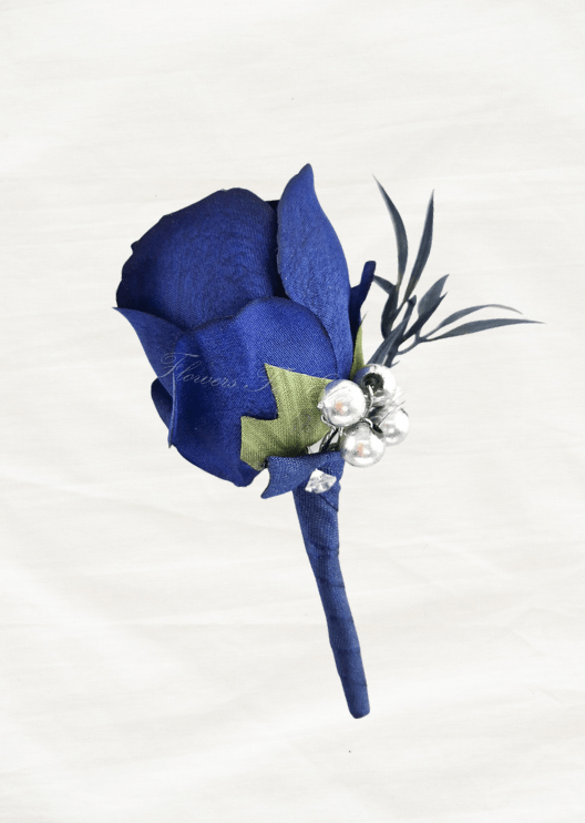 Artificial wedding boutonniere with a navy blue faux rose, silver beads, dark slender foliage and a navy-wrapped stem. For formals, proms and ball occasions. Made in Melbourne by Flowers For Ever After, shipping Australia and Worldwide.