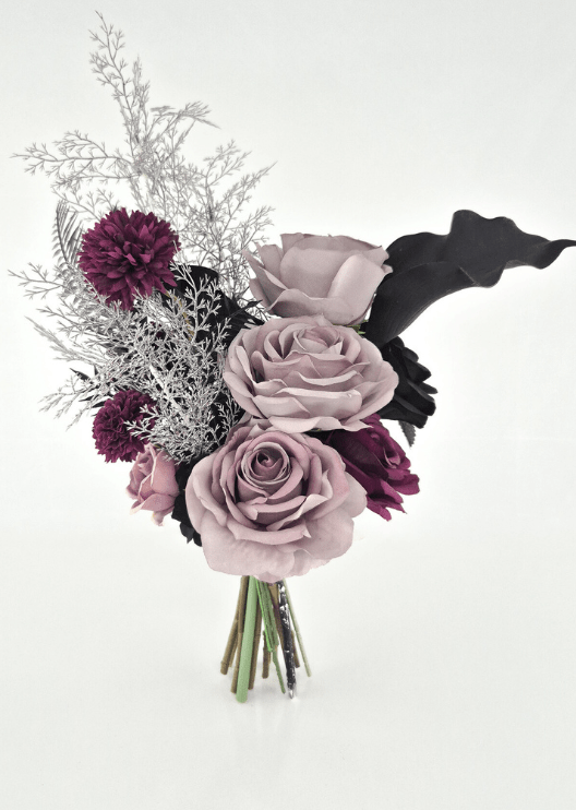 Artificial wedding bridesmaid bouquet with dusty lilac and black faux roses, burgundy pompom flowers, black calla lily and fine silver sprigs. Made in Melbourne by Flowers For Ever After, shipping Australia and Worldwide.