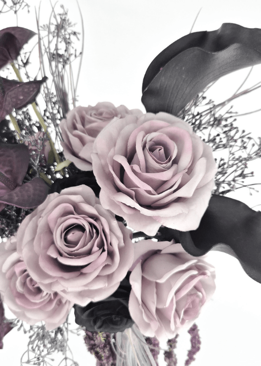 Artificial wedding bouquet detail showing dusty lilac faux roses, black calla lilies, black roses and fine silver branches. Made in Melbourne by Flowers For Ever After, shipping Australia and Worldwide.