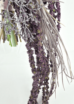 Artificial wedding cascading bouquet detail showing trailing dark purple faux floral strands, long silver grass-like leaves and gathered green stems. Made in Melbourne by Flowers For Ever After, shipping Australia and Worldwide.