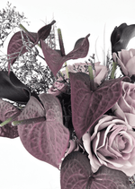 Artificial wedding bouquet close-up showing heart-shaped mauve faux anthuriums, dusty lilac roses and fine silver foliage. Made in Melbourne by Flowers For Ever After, shipping Australia and Worldwide.