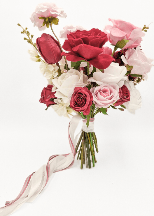 Artificial wedding bouquet, front view of mixed faux blooms and green leaves. Made in Melbourne by Flowers For Ever After, shipping Australia and Worldwide.
