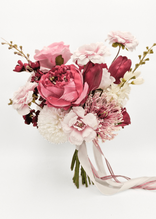 Artificial wedding bouquet with mixed faux flowers, green foliage and ribbon-wrapped stems. Made in Melbourne by Flowers For Ever After, shipping Australia and Worldwide.