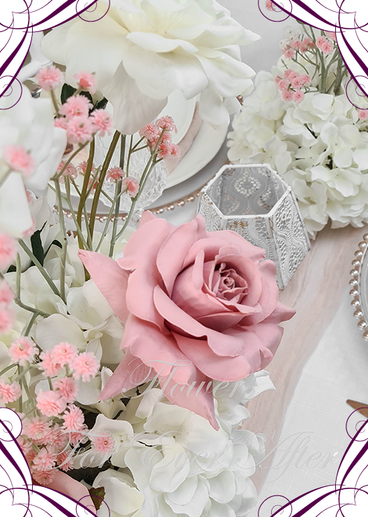 Artificial wedding floral close-up showing a dusty pink faux rose, cream blooms, white hydrangea and delicate pink baby's breath. Made in Melbourne by Flowers For Ever After, shipping Australia and Worldwide.