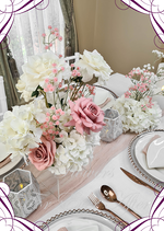 Artificial wedding centrepiece with dusty pink faux roses, cream blooms, white hydrangea and pink baby's breath, with a smaller matching arrangement. Made in Melbourne by Flowers For Ever After, shipping Australia and Worldwide.