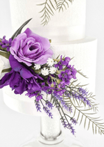 Artificial wedding cake flower detail with a lilac faux rose, dark purple bloom, tiny white flowers and lavender-like sprigs. For birthday, event and celebration cakes. Made in Melbourne by Flowers For Ever After, shipping Australia and Worldwide.