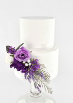 Artificial wedding cake decoration, front view of a lilac faux rose, dark purple bloom, white rose and fern-like leaves. For birthday, event and celebration cakes. Made in Melbourne by Flowers For Ever After, shipping Australia and Worldwide.