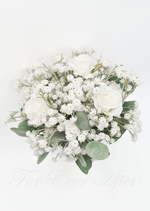 Artificial wedding bridesmaid bouquet with white faux roses, clustered white baby's breath and rounded eucalyptus leaves. Made in Melbourne by Flowers For Ever After, shipping Australia and Worldwide.