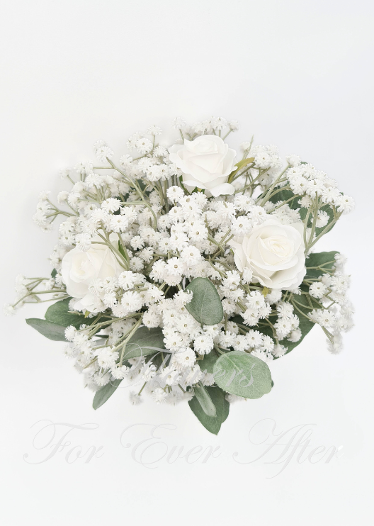 Artificial wedding bridesmaid bouquet with white faux roses, clustered white baby's breath and rounded eucalyptus leaves. Made in Melbourne by Flowers For Ever After, shipping Australia and Worldwide.