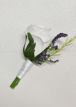 Artificial wedding boutonniere with a white faux rose, green leaves and delicate white sprigs, with wrapped stems. For formals, proms and ball occasions. Made in Melbourne by Flowers For Ever After, shipping Australia and Worldwide.